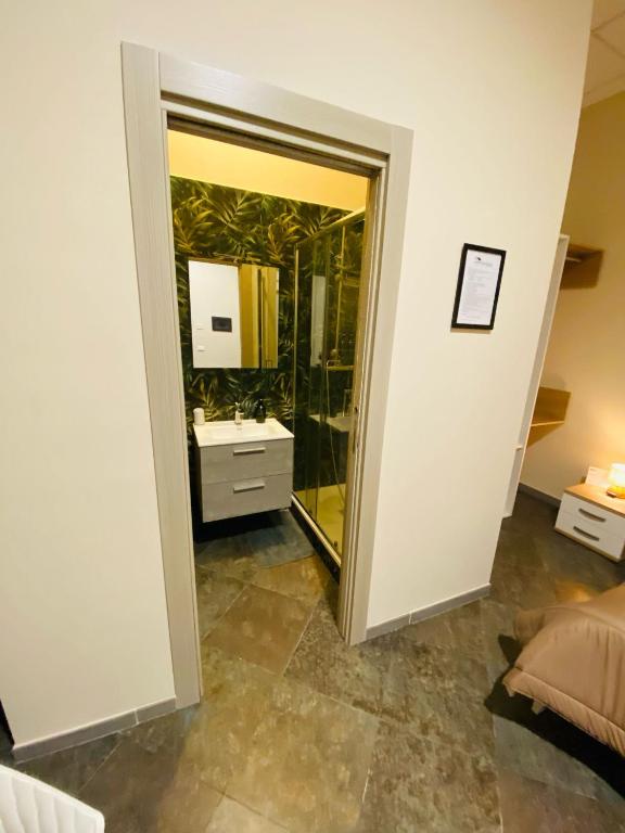 Postel nebo postele na pokoji v ubytování B&B l'angoletto