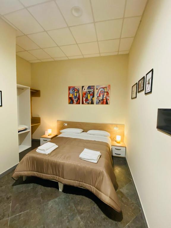 Postel nebo postele na pokoji v ubytování B&B l'angoletto