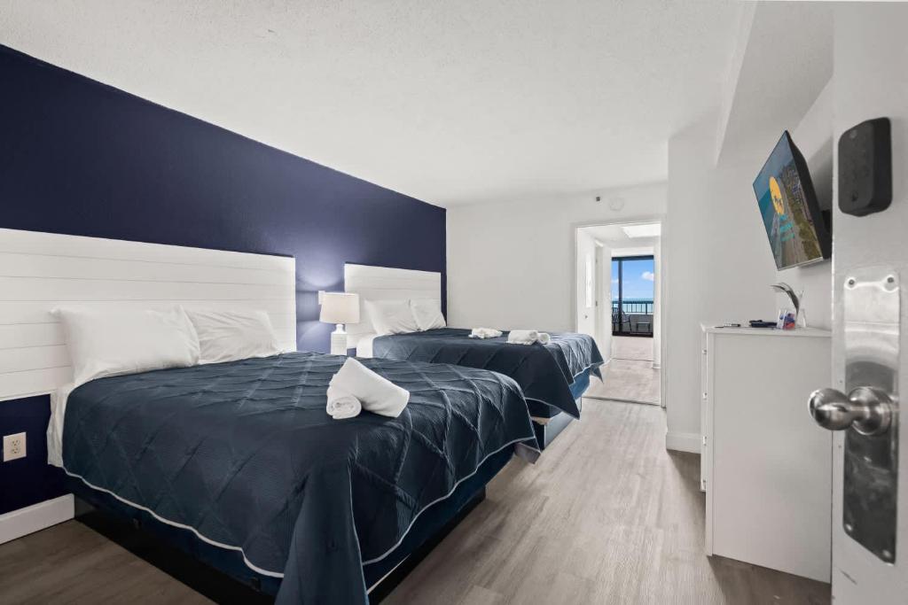 Ein Bett oder Betten in einem Zimmer der Unterkunft Compass Cove 759 - Oceanfront
