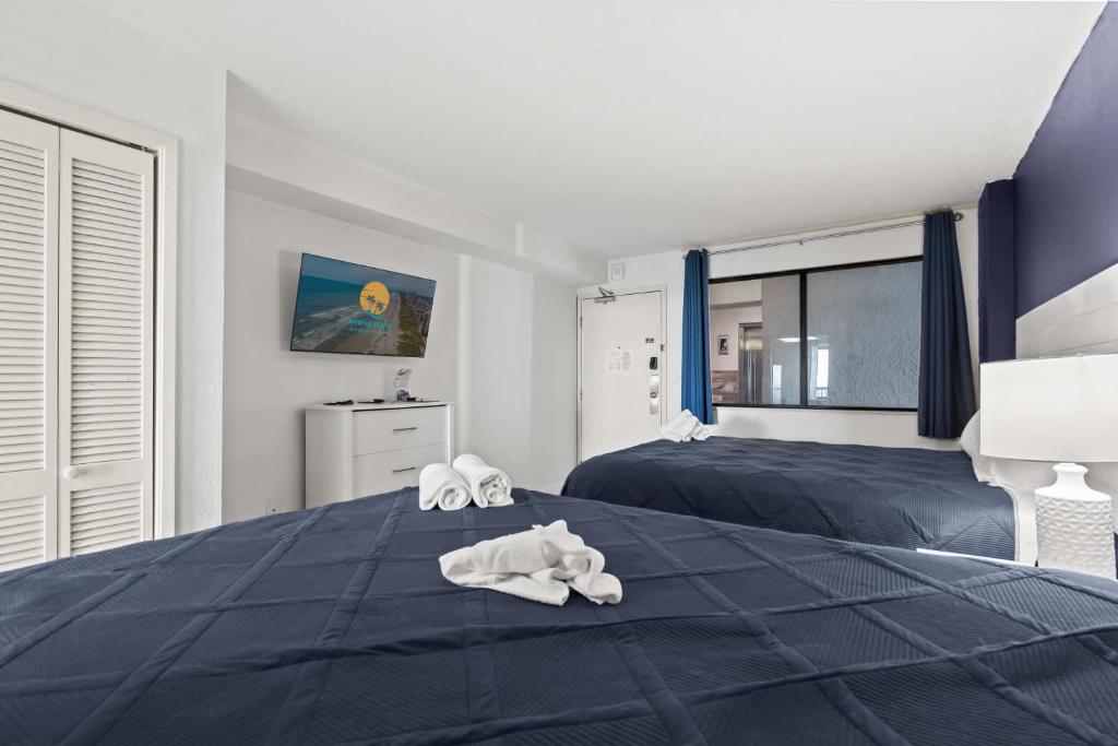 Ein Bett oder Betten in einem Zimmer der Unterkunft Compass Cove 759 - Oceanfront