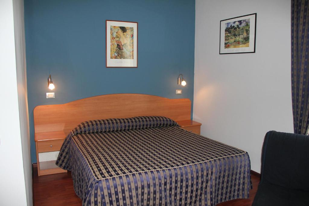 Postel nebo postele na pokoji v ubytování B&B Luna Blu