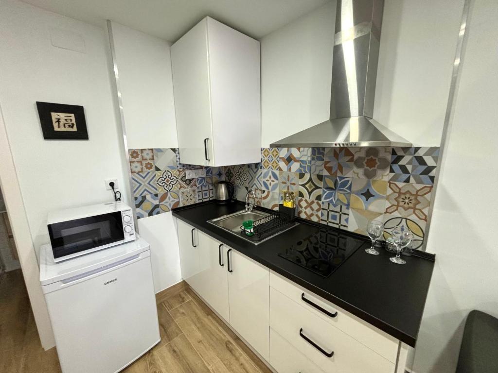 Kuchyň nebo kuchyňský kout v ubytování ANSA Beach Apartments - Why Not Málaga