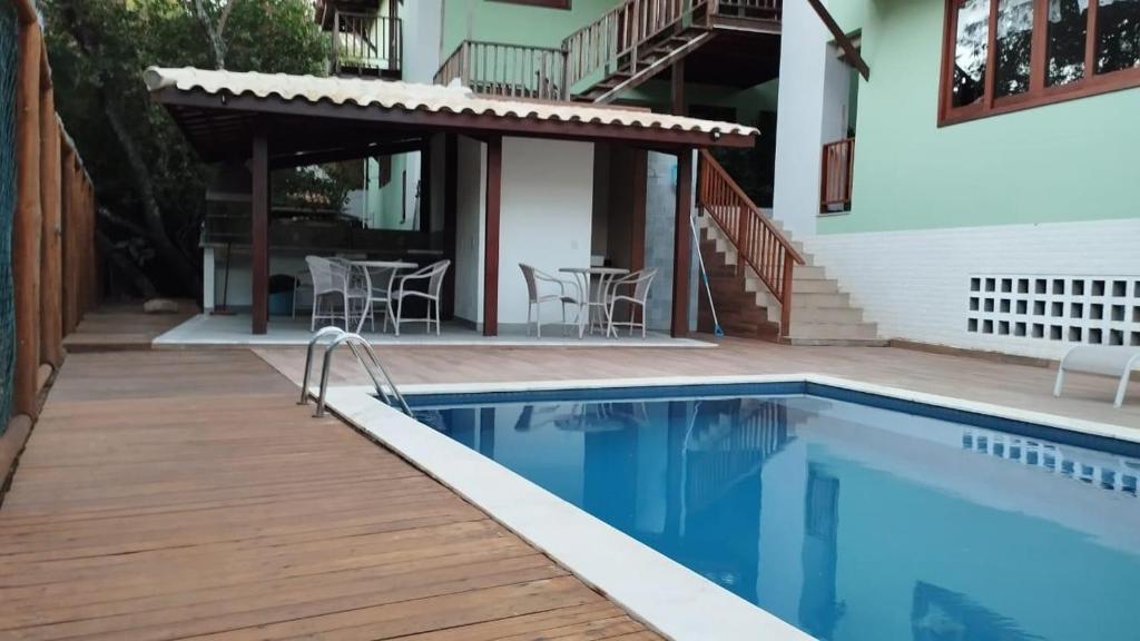 Bazén v ubytování Paraiso da Praia do Forte nebo v jeho okolí