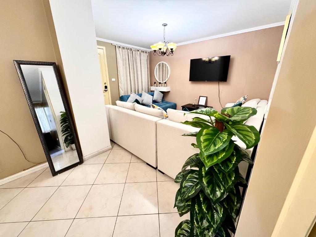 TV a/nebo společenská místnost v ubytování Apartamento en la mejor ubicación, centro de Loja
