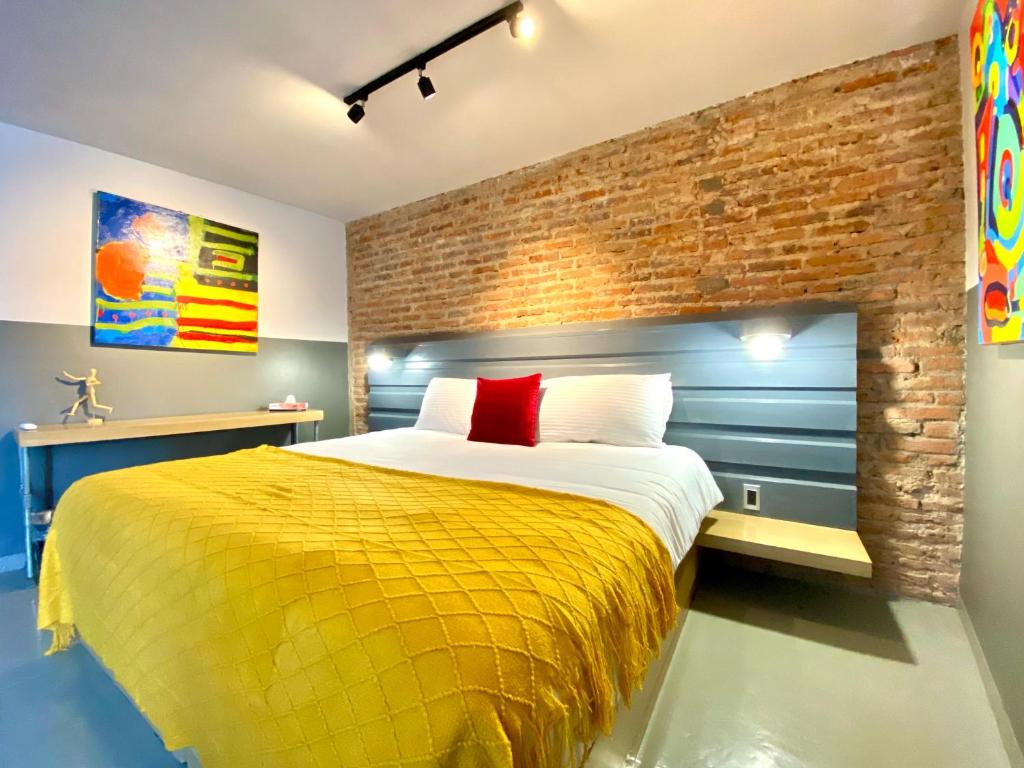 Ένα ή περισσότερα κρεβάτια σε δωμάτιο στο Hotel NEXT