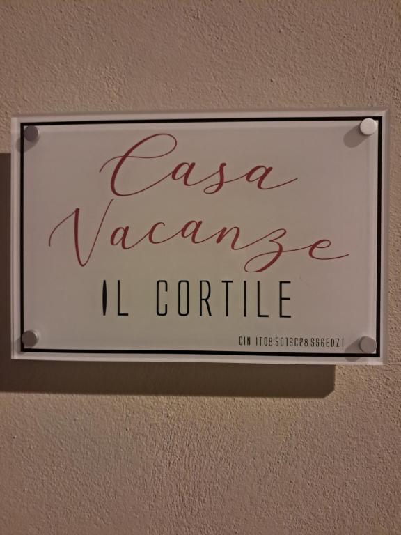 a sign on a wall that reads casa varennes ii centrale at Casa il cortile in San Cataldo