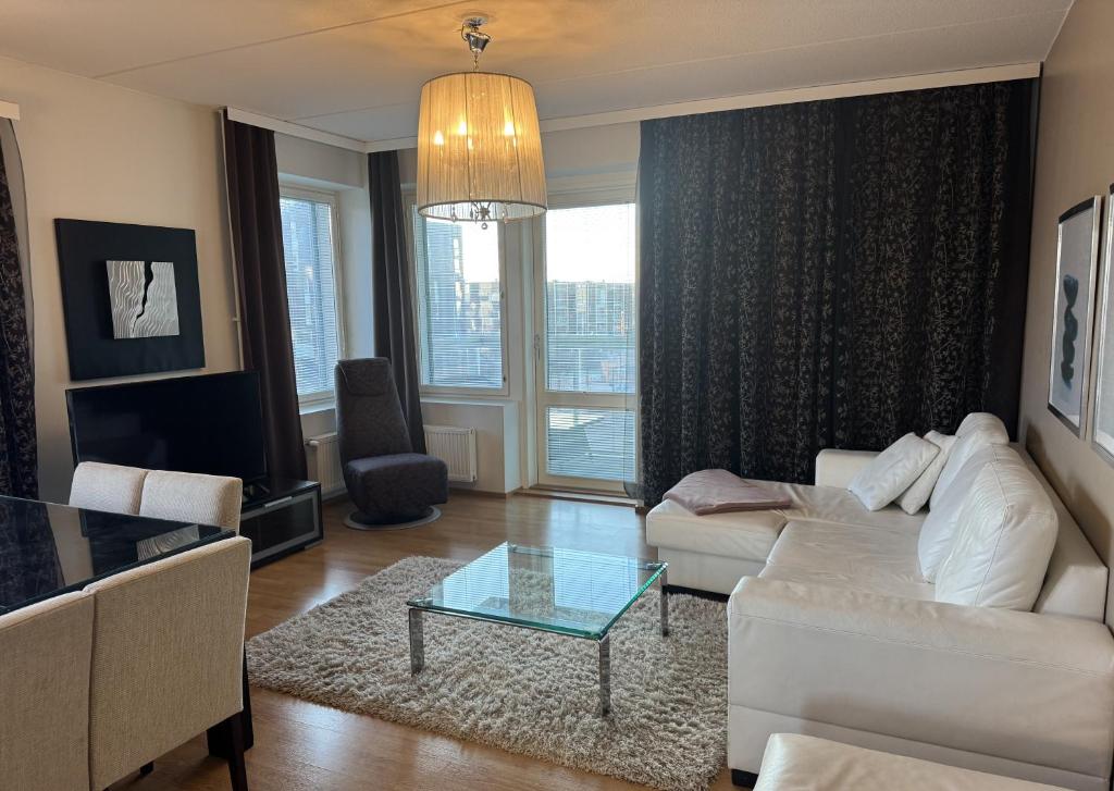 Χώρος καθιστικού στο Gella Canalside Apartments with sauna and balcony in address Saukonpaadenranta 4