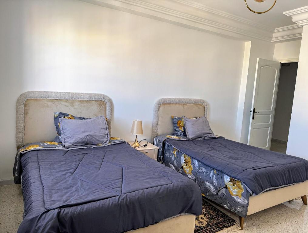 Postel nebo postele na pokoji v ubytování Appartement entier rénové à 5min de la Plage de Sousse