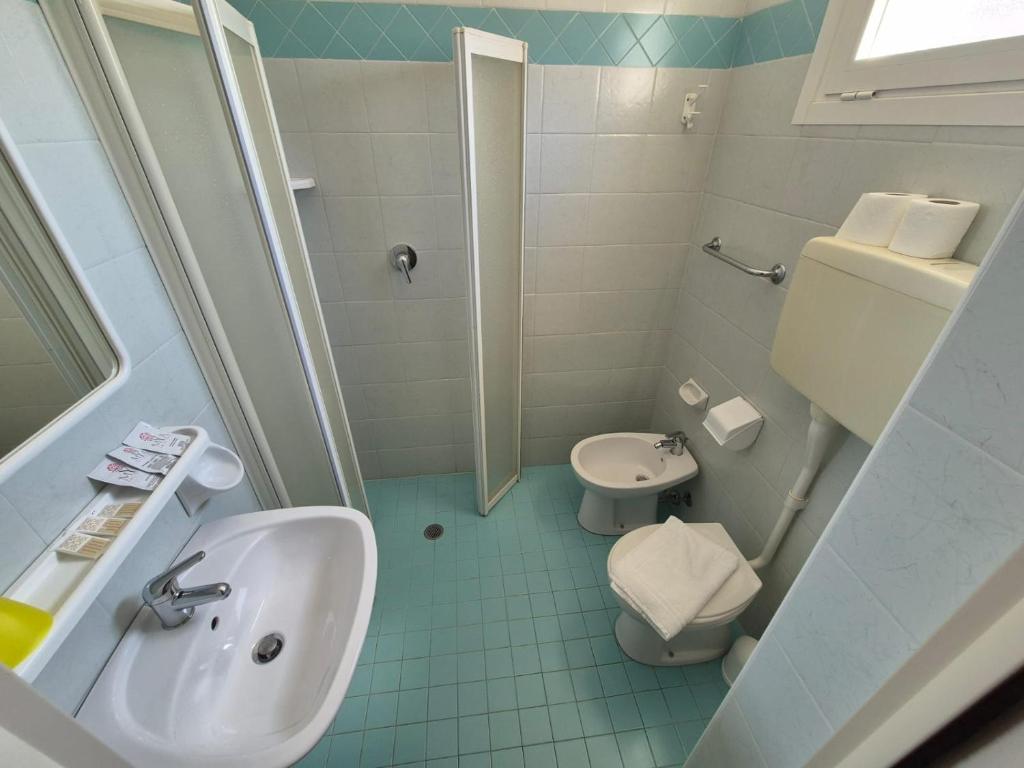 Koupelna v ubytování Hotel REX