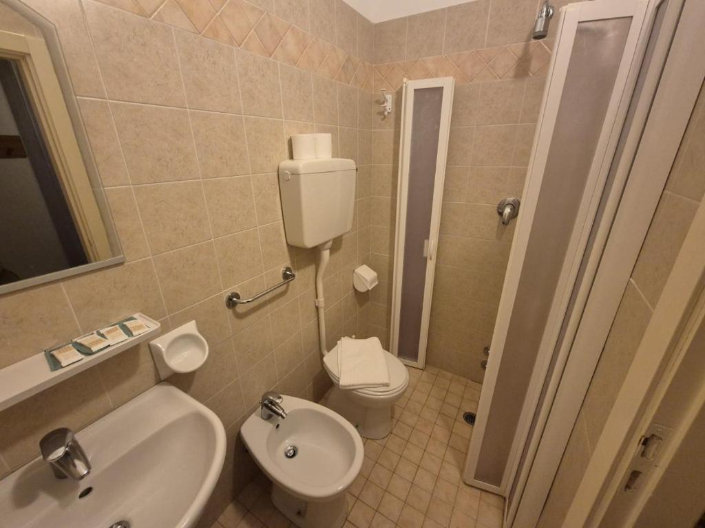 Koupelna v ubytování Hotel REX
