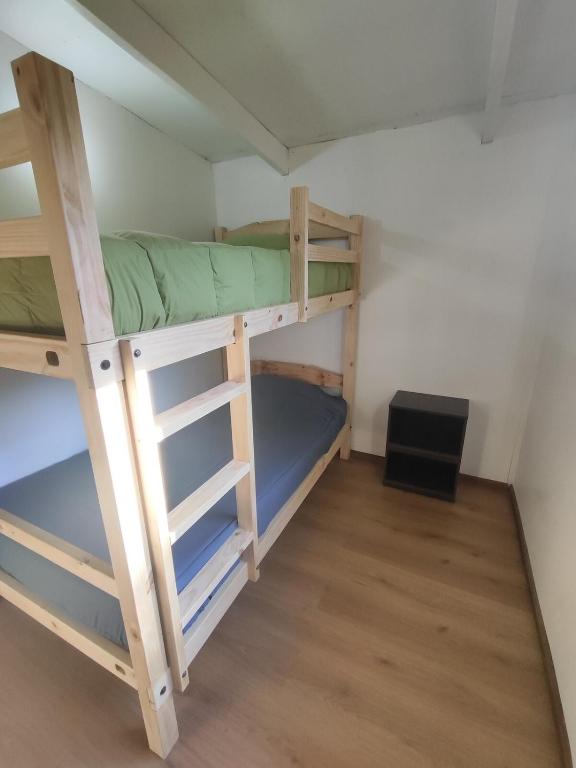 Postel nebo postele na pokoji v ubytování Estancia Lumaco