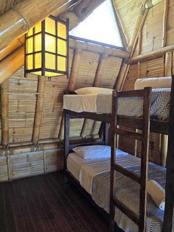 Postel nebo postele na pokoji v ubytování Las Cabañas de Antica