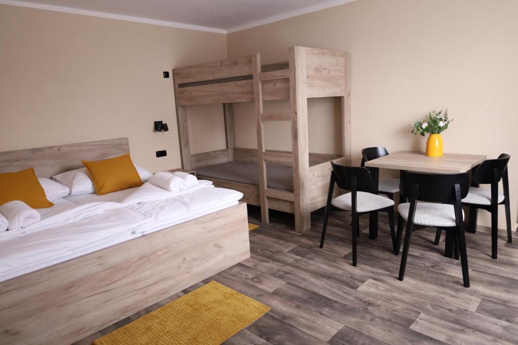 Postel nebo postele na pokoji v ubytování Ubytování U Pupka