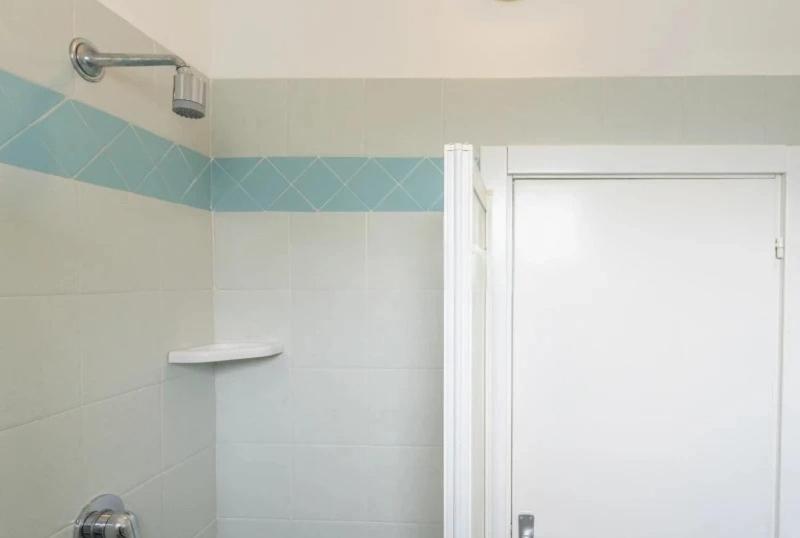 Koupelna v ubytování Hotel REX