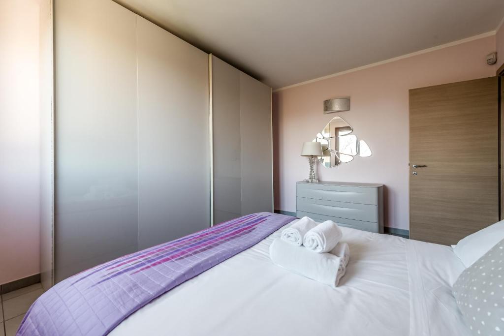 Postel nebo postele na pokoji v ubytování Hostly-Family Home Fosso Vecchio-Relax in Tuscany
