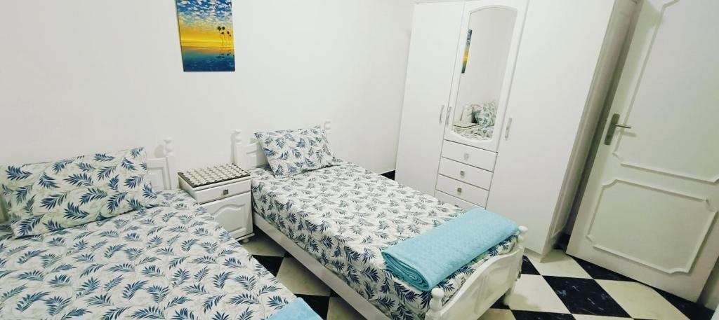 Postel nebo postele na pokoji v ubytování Alex's Homes 1