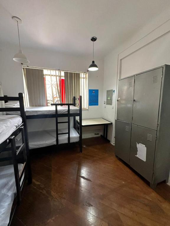 Postel nebo postele na pokoji v ubytování São Paulo Global Hostel