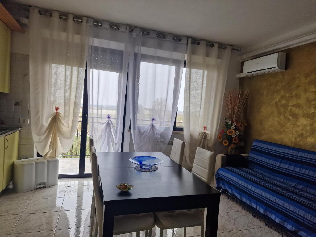 A seating area at Appartamento Divino Tramonto