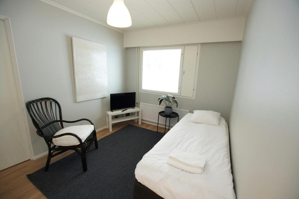 Giường trong phòng chung tại Practical Apartment for 2