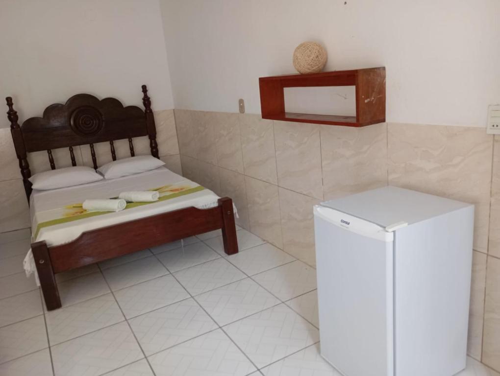 Postel nebo postele na pokoji v ubytování Pousada Iakã Boipeba