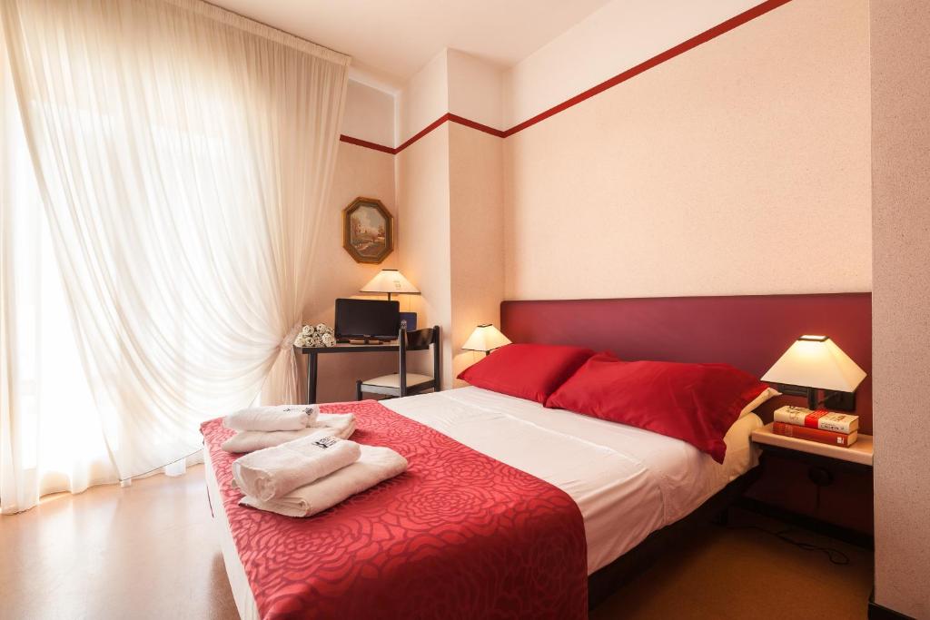 Postel nebo postele na pokoji v ubytování Hotel Ca' Di Valle