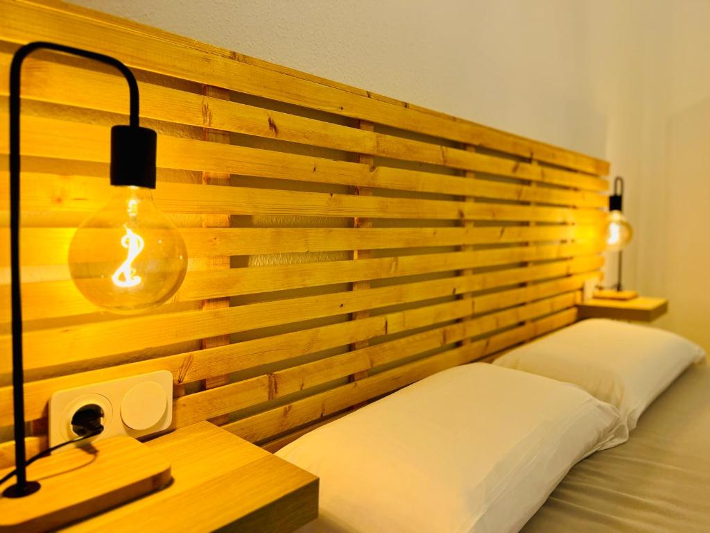 En eller flere senge i et værelse på Apartamento Infantes 8 - CENTRO CIUDAD