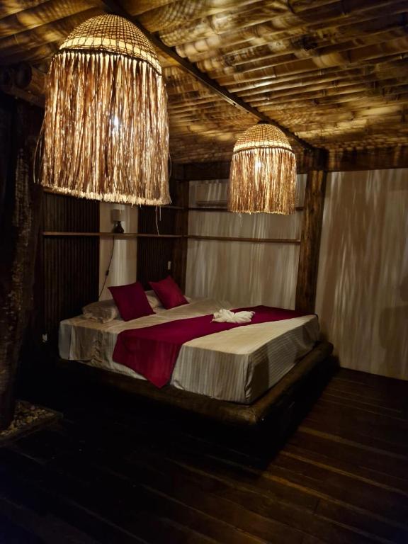 Postel nebo postele na pokoji v ubytování Ecohotel Alflo Inn