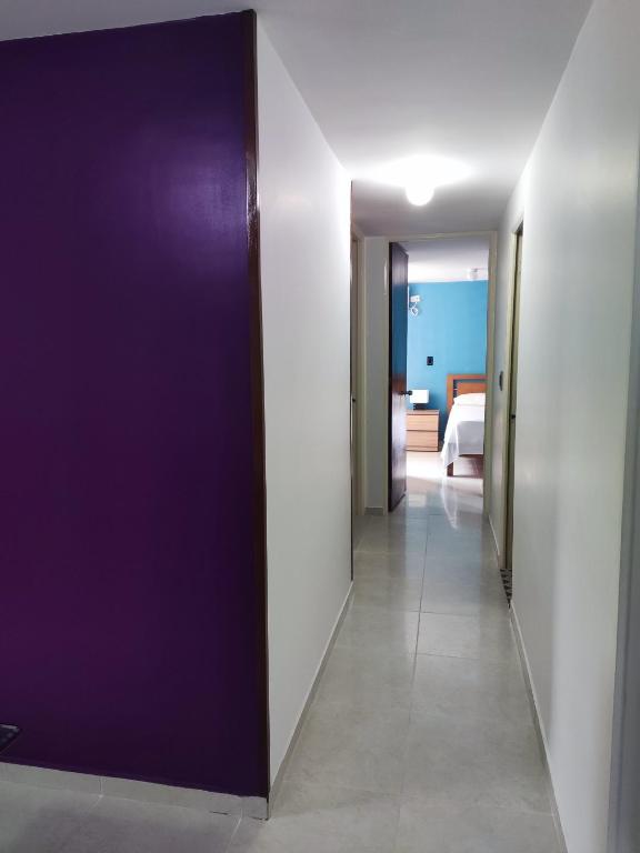 Postel nebo postele na pokoji v ubytování Confort y Estilo ideal en Neiva