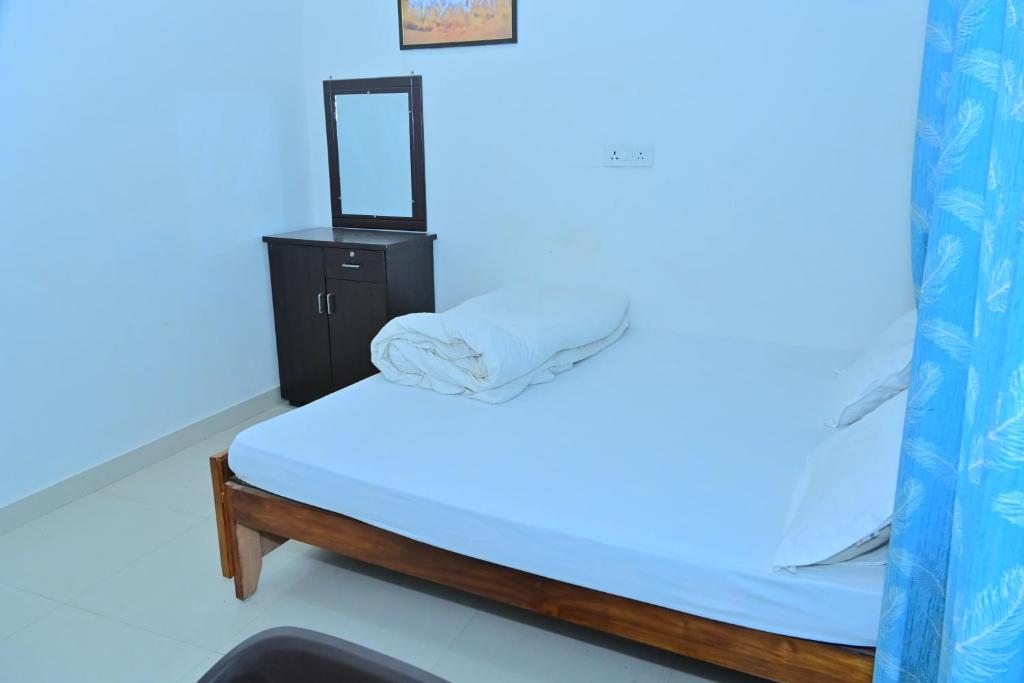 Voodi või voodid majutusasutuse Hotel BK Palace toas