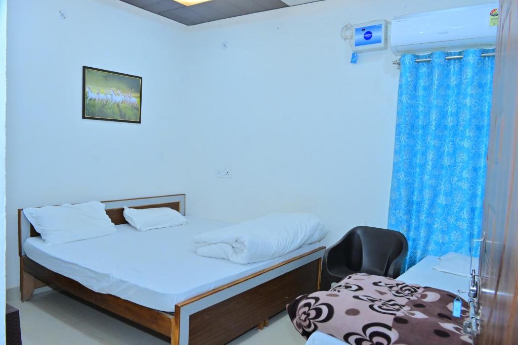 Voodi või voodid majutusasutuse Hotel BK Palace toas