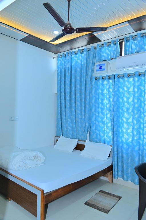 Voodi või voodid majutusasutuse Hotel BK Palace toas