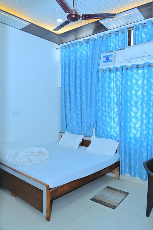 Voodi või voodid majutusasutuse Hotel BK Palace toas