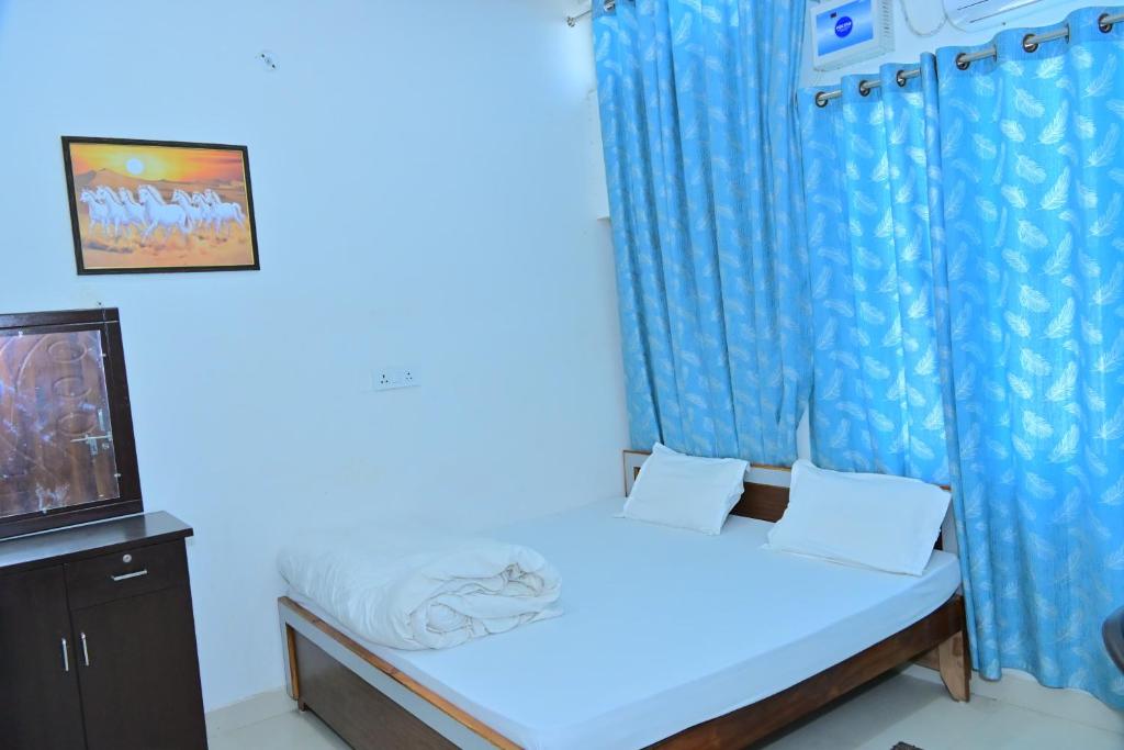 Voodi või voodid majutusasutuse Hotel BK Palace toas