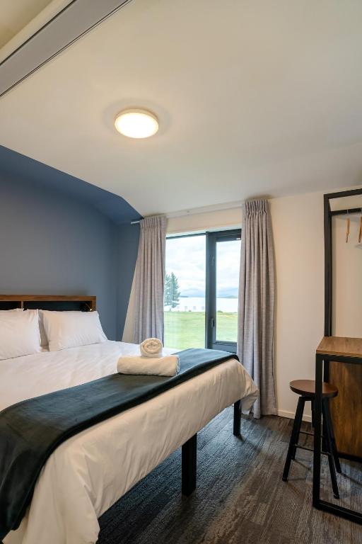 Postel nebo postele na pokoji v ubytování Haka House Lake Tekapo