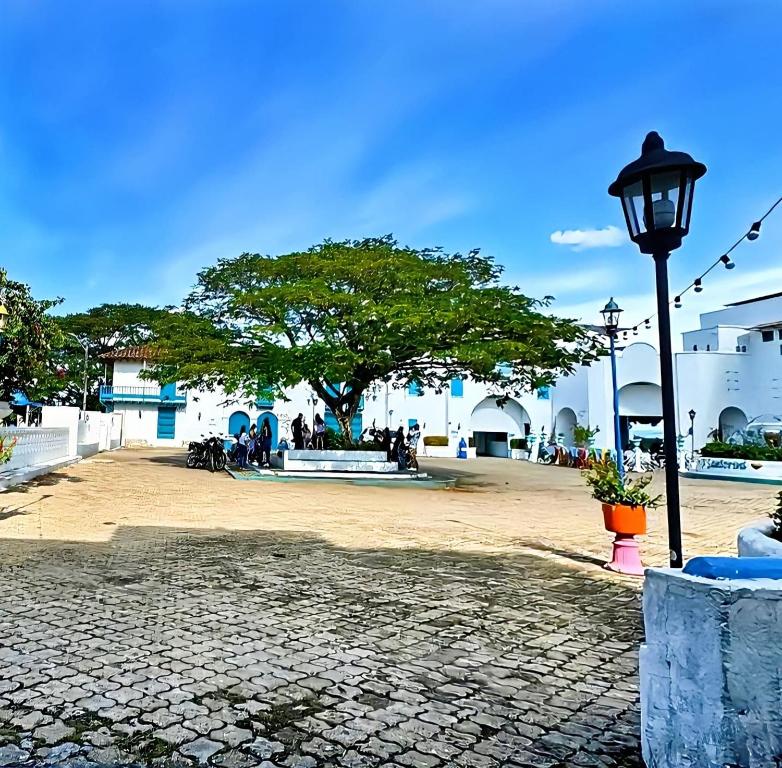 Photo de la galerie de l'établissement Hotel Santorini Aldea Doradal, à Puerto Triunfo