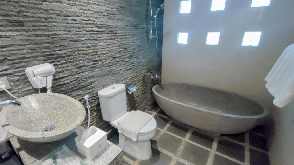 Koupelna v ubytování Puteri Gunung Hotel