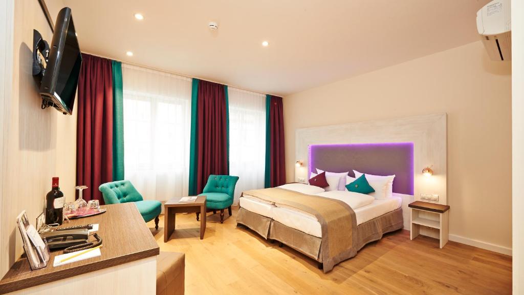 Postel nebo postele na pokoji v ubytování Hotel Elch Boutique