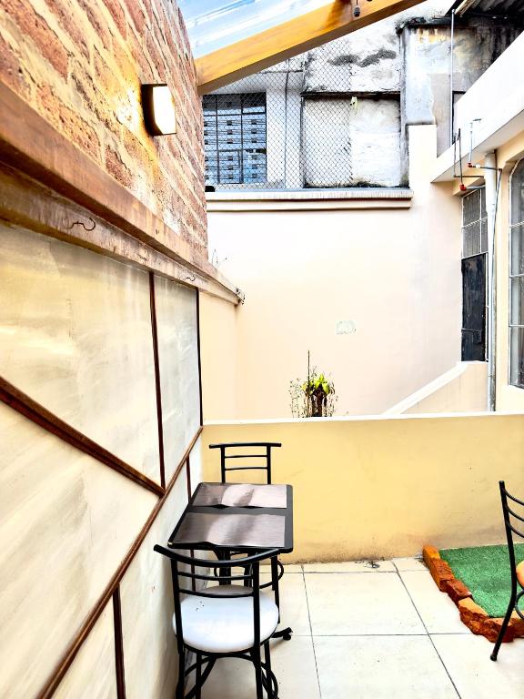 Balkón nebo terasa v ubytování Travel Hotel Quito