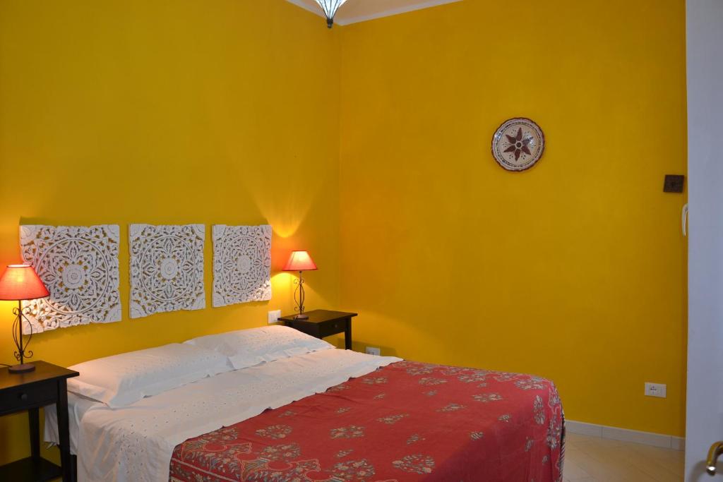 Postel nebo postele na pokoji v ubytování B&B Talìa