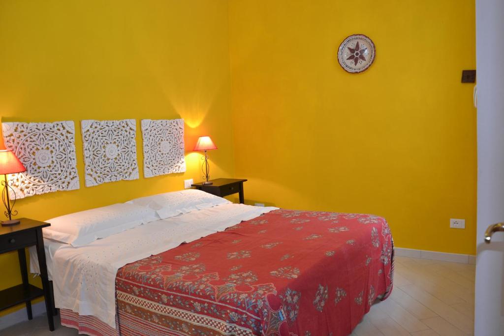 Postel nebo postele na pokoji v ubytování B&B Talìa