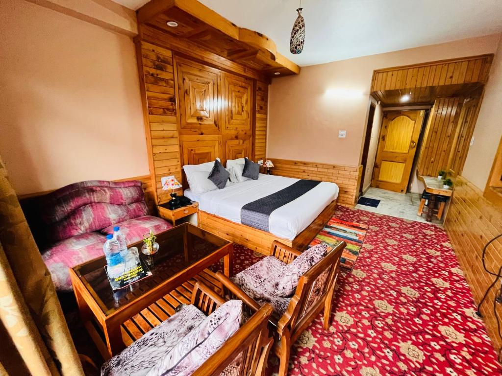 Voodi või voodid majutusasutuse The Four Season Hotel & Resort, Manali - A blissful view from rooms toas