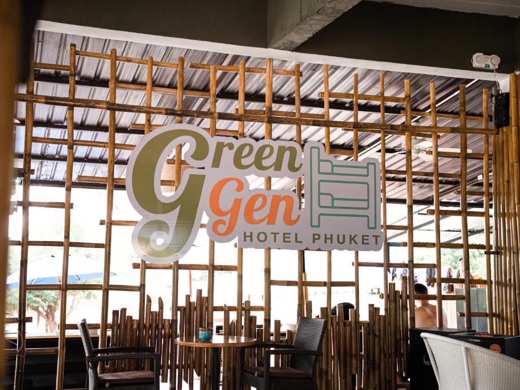 a sign that reads green seven gem hotel philippines at Green Gen Hotel Phuket in Phuket
