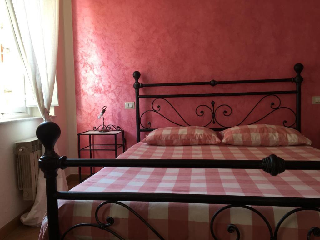 Posteľ alebo postele v izbe v ubytovaní L'Iris B&B