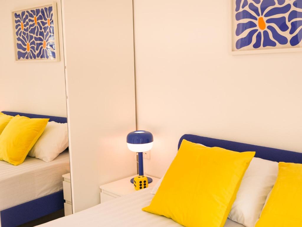 Postel nebo postele na pokoji v ubytování Place Hotel