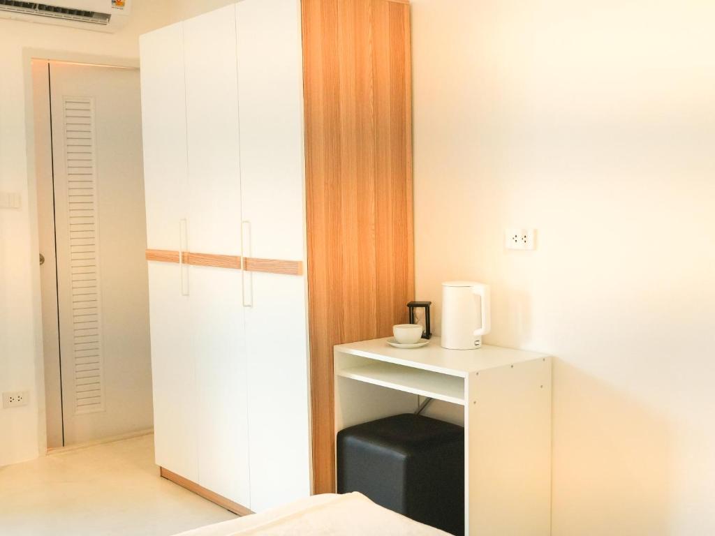 Postel nebo postele na pokoji v ubytování Place Hotel