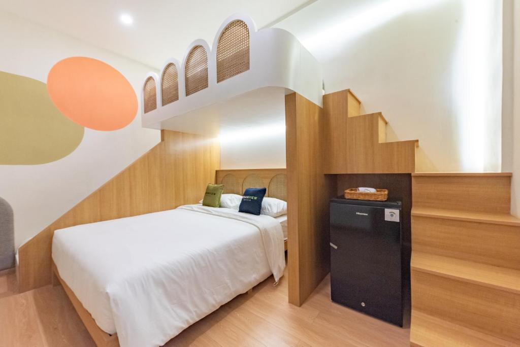 Ένα ή περισσότερα κρεβάτια σε δωμάτιο στο Casabella Bandung PVJ CIWALK PASTEUR LEMBANG