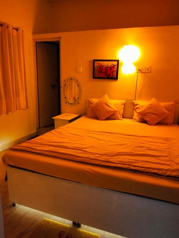 Postel nebo postele na pokoji v ubytování Greenland rooms