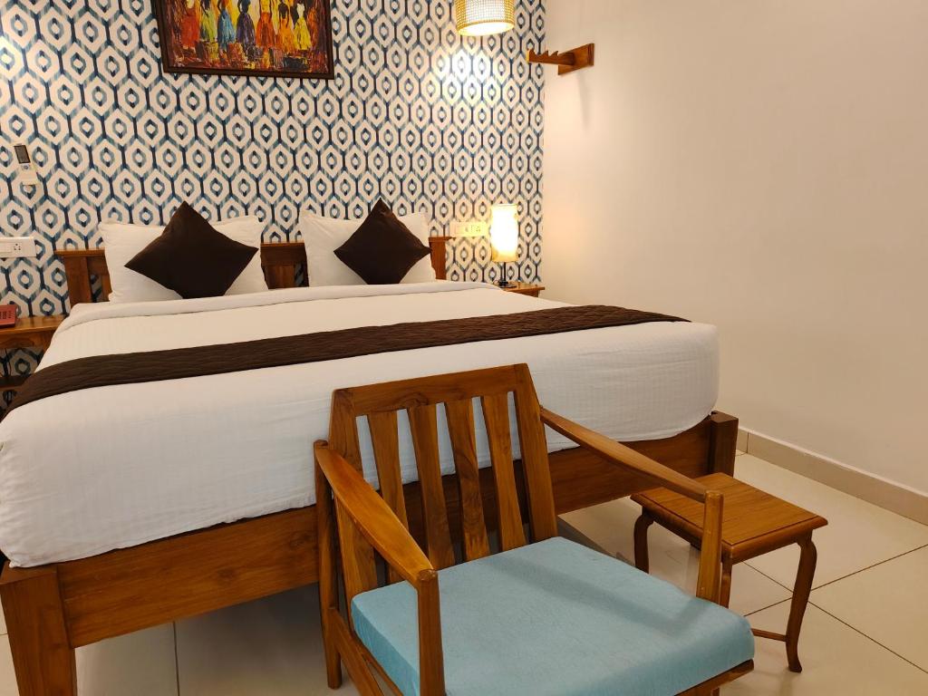 Postel nebo postele na pokoji v ubytování Hotel Aura by Woco Stays