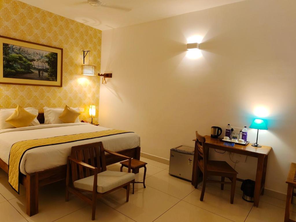 Postel nebo postele na pokoji v ubytování Hotel Aura by Woco Stays