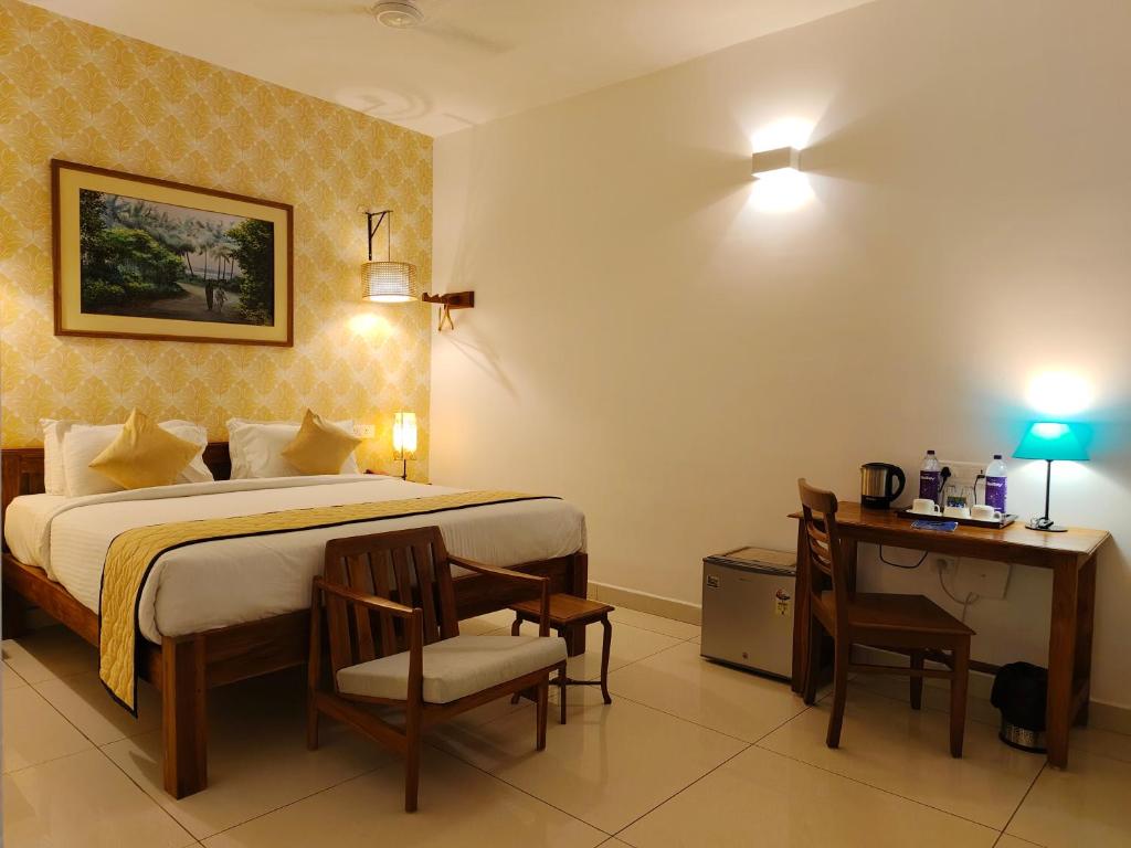 Postel nebo postele na pokoji v ubytování Hotel Aura by Woco Stays